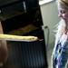 Ann Arbor resident Hannah Watt, 7, gets a close encounter with an albino Burmese Python during Earth Day on Sunday, April 21. AnnArbor.com I Daniel Brenner